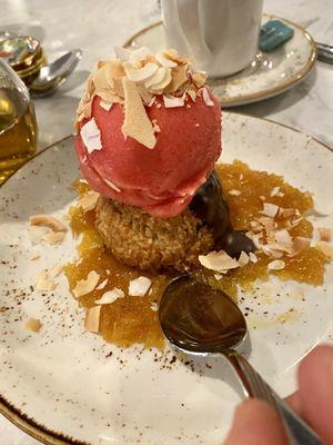 Sorbet on a macaron with pineapple sauce