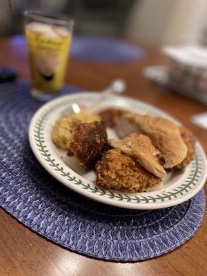 With corn bread, beans, and Mac and cheese.