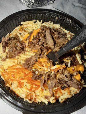 cheese Cheesesteak hashbrown bowl w/ four eggs.....no eggs and nothing asked for