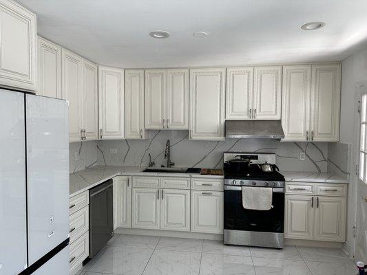 Charleston White with Calacatta Laza Gold Quartz countertops