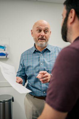 Dr. Messer talking with a patient