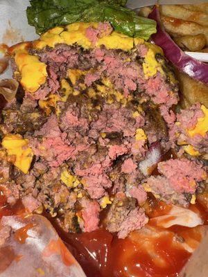 This is "medium" cooked burger. Inedible. We tried...Should you be able to create your own raw burger from a burger you ordered?