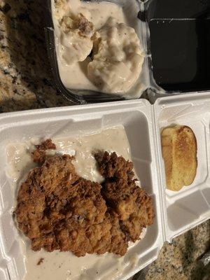 Monster Chicken Fried Steak with gravy.