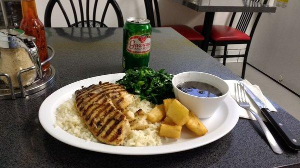 Fish plate, fried yucca and greens - and a Brazilian soda!