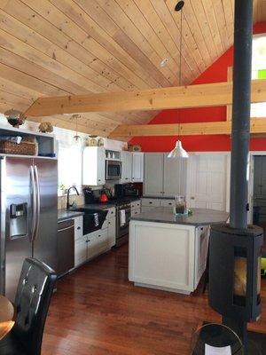 Custom built kitchen with concrete counter tops.