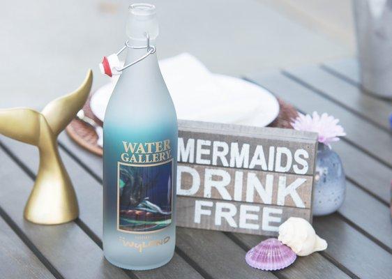 Wyland mermaid bottle.