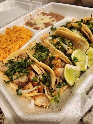 Chicken street tacos with rice with beans and cheese