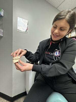 Chelsea explains my dental casts.
