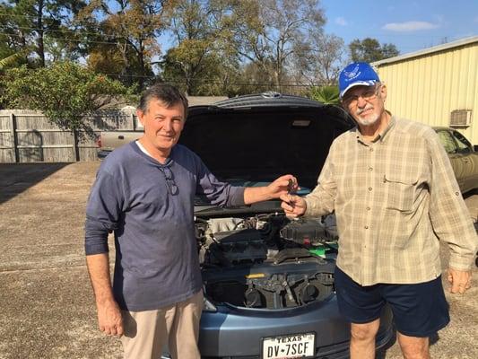 Mike Jenkins, handing off the keys to a satisfied customer.