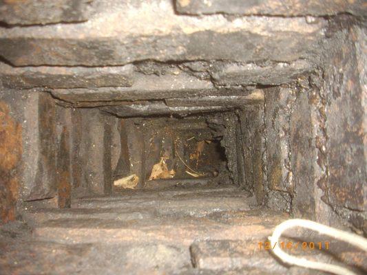 This is what an unlined chimney looks like! Very likely to catch combustibles near the chimney on fire.