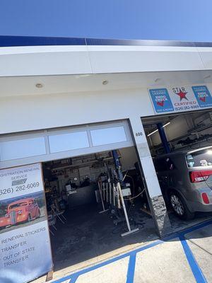 Getting car smogged waiting area and car smog side