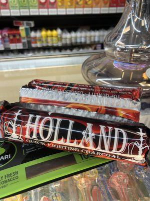 Coals that light with a lighter.