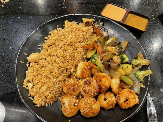 Shrimp and scallops with vegetables and fried rice