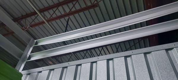 Climbed over...bent..
left black zip ties everywhere ...must be some of my stuff on other side