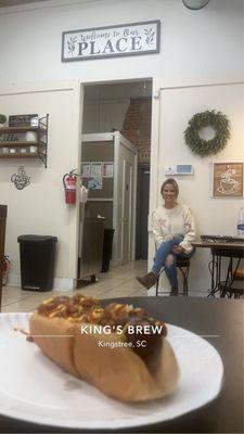 This is one the best baristas in the buiness with one of their legendary sausage dog!