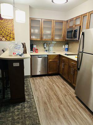 the kitchenette that came fully stocked with necessities (pots, pans, utensils) to cook a simple meal