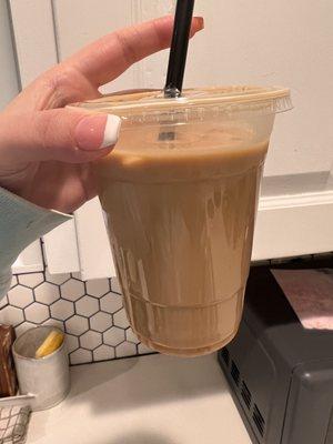 Warm iced americano with no ice and burnt shots