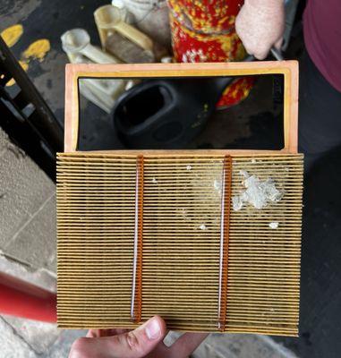 The engine air intake filter with a bugs nest in it (found at time of oil change)