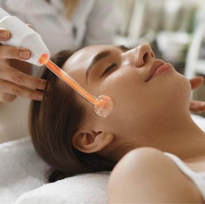 Radio Frequency Treatment -- stimulates collagen and elastin growth, tightens skin, reduces wrinkles and smooths skin.