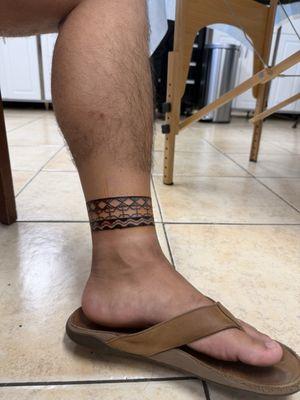 Filipino style ankle tattoo