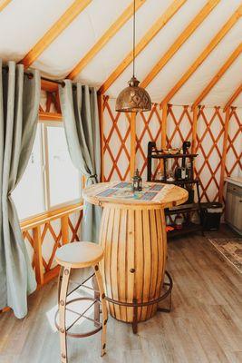 Bar table and chairs in Cinnabar.