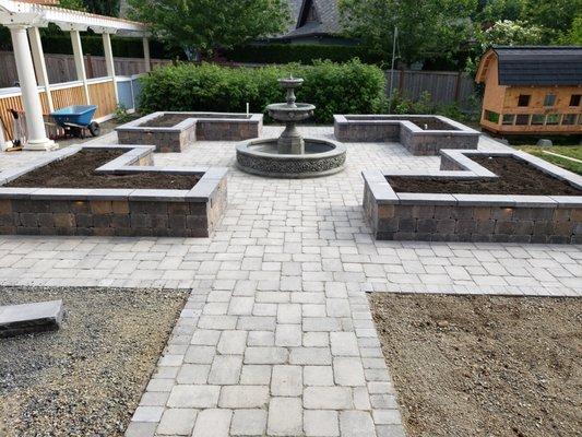 Borozan in Woodenville project all Western Interlock materials. full patio walkway, flower beds, lighting, irrigation for beds, 1 of 3