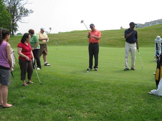 teaching a corporate golf clinic