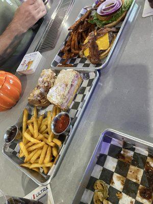Fried jalapeños , monte Cristo with regular fries and cheeseburger with bacon and sweet potato fries