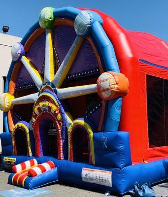 Our newest FERRIS WHEEL... a giant attraction.