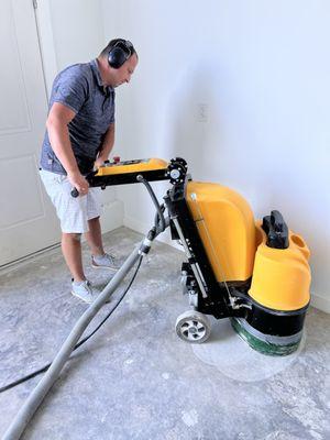 Grinding the concrete with 30 grit diamond blades for surface prep on this 2,000 sq ft. storage condominium