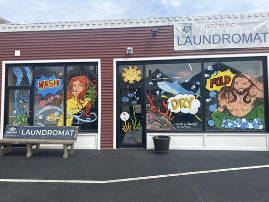 Murals by Tuesday (very talented person)!! More to the point- the staff is fantastic. The owners are great too