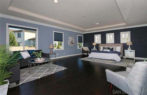 Beautiful master bedroom staged by Blue Birch Home Staging.
