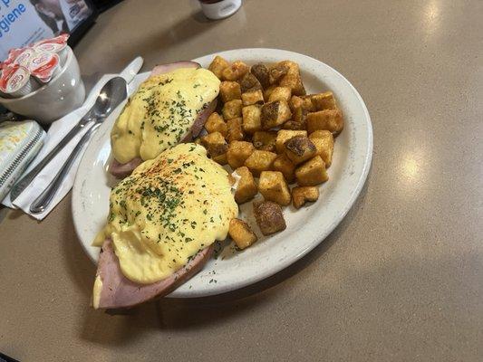 Eggs Benedict with breakfast potatoes