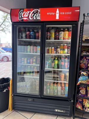 Display with drinks, aguachile, and ceviche