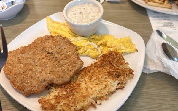 Burnt hashbrowns, overcooked chicken fried steak. Cold and dry eggs and cold gravy