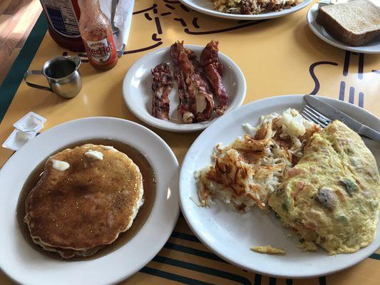 5 egg veggie omelet with hash browns, pancakes & side of bacon. Under $15! Delish!!