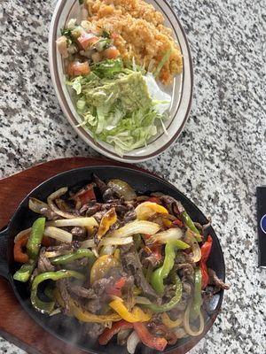 Steak fajitas marinated with our special seasoning cooked with onions and bell peppers