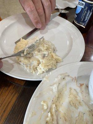 Mashed potatoes and white gravy