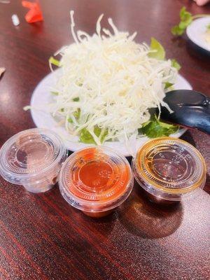 Condiments for spicy noodle soup.