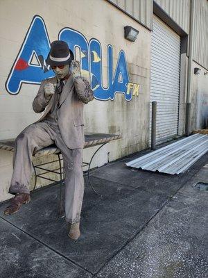 Look for this guy, EAL is across from this business.