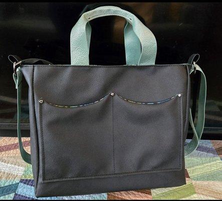 Laptop travel bag made with gunmetal hardware and zippers!