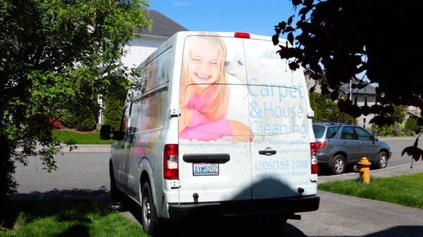 Brand new van parked at customer's driveway
