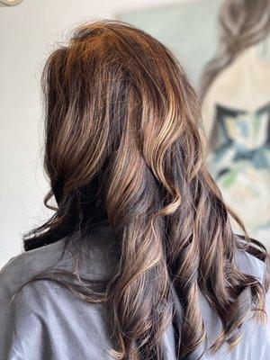 Deep Mocha brown undertones with Carmel hilights to set off her just installed hair extensions