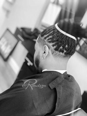 Dreads with taper by Raymond
