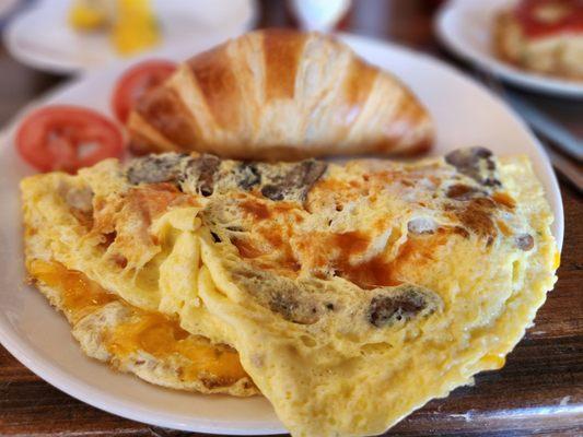 Omelet and croissant