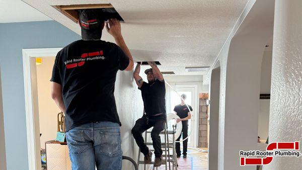 Here you can see our team completing a whole-home repipe. We opened small access points in the ceiling to replace aging water lines with new