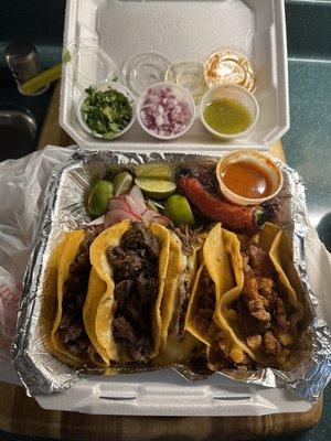 A mix of tacos: asada, barbacoa, pastor and I'm not sure but everything was