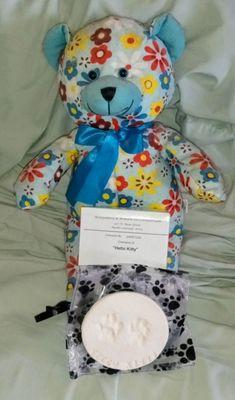 My cat's ashes with her paw prints.