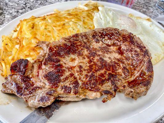 Ribey steak (10oz), eggs, hash browns