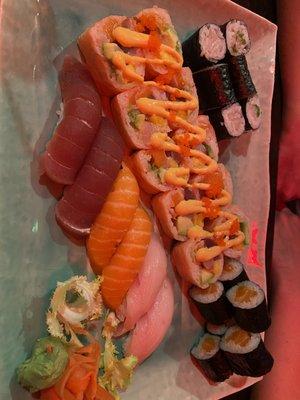 Top left: yellowtail scallion
Middle: mermaid
Top right: salmon roll
Bottom: tuna, salmon, yellowtail nigiri